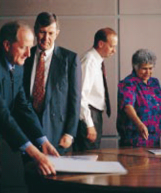 At a meeting in Melbourne of the consultative committee on the Federation note design: Philip Cox and Lois O'Donoghue, with Geoff Board and David Reynolds.