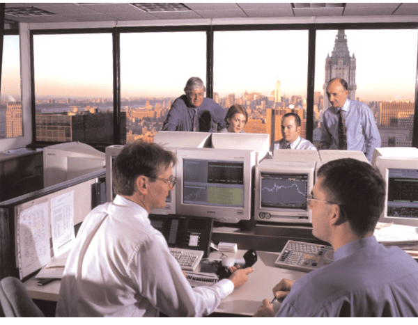 Neil Mackrell (left rear), Chief Representative, New York and staff of the New York Representative Office receive Assistant Governor (Financial Markets), Ric Battellino (right rear).