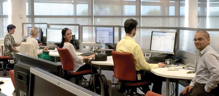 Information Department staff at the Reserve Bank's Business Resumption Site on Tuesday, 16 December 2014, the day after the Lindt Café siege, (from left) Jacqui Dwyer (Head of Information Department), Rhiannon Hornsey, Renée Mitchell, Jens Korff and Raj Kannori